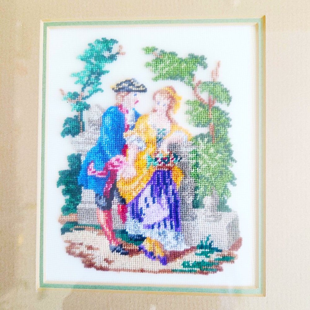 Vintage framed needlepoint picture with 19 century scene.